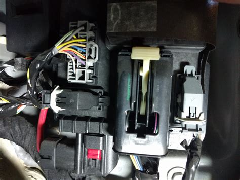 Where is the smart junction box located in a 2011 Lincoln